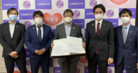 府中市に防護服200着を寄贈の画像